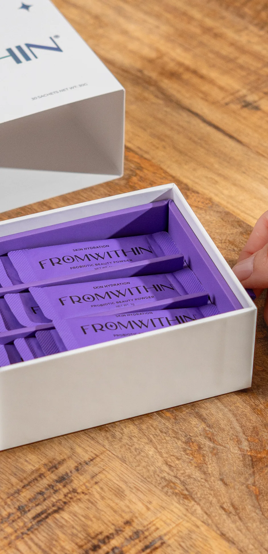 Sliding open the FROMWITHIN box to reveal the sachets